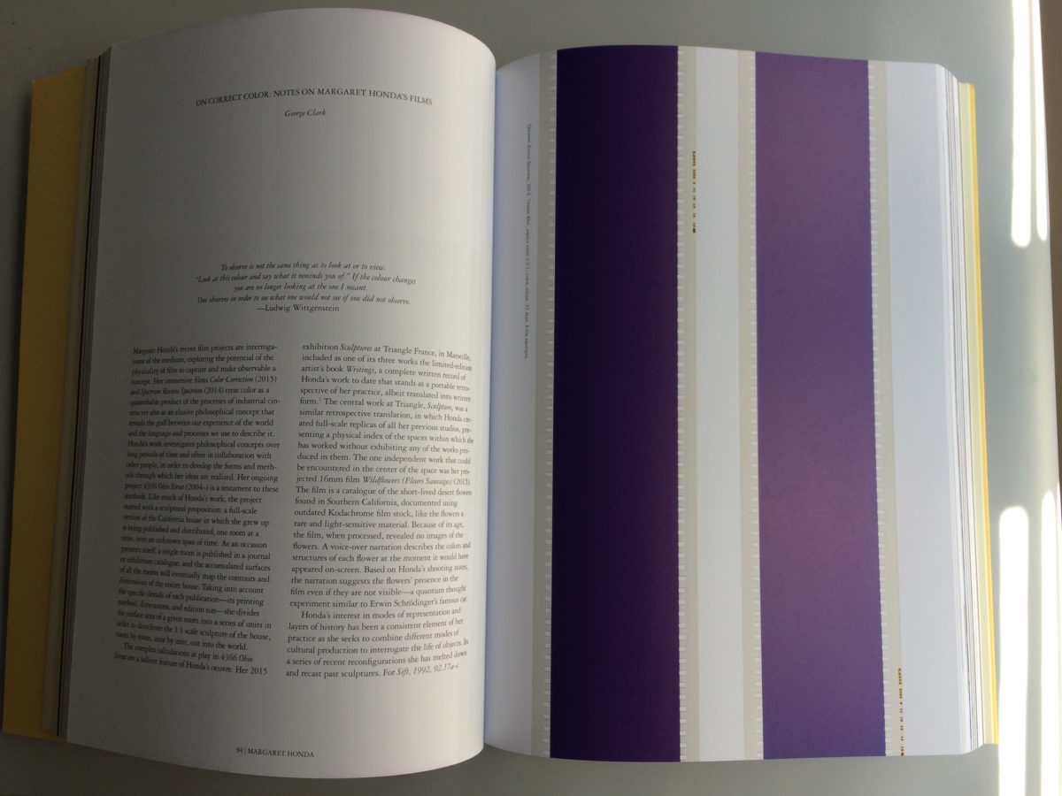 Photo of exhibition catalogue with essay On Correct Colour: Notes on Margaret Honda's Films
